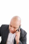 Businessman Talking On Mobile Phone Stock Photo