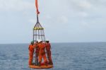 Transfer Crews By Personal Basket From The Platform To Crews Boat Stock Photo