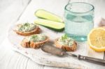 Bread With Tzatziki On The White Wooden Table Horizontal Stock Photo