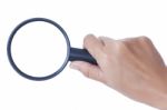 Hand Holding Magnifying Glass Stock Photo