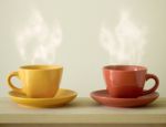 Steaming Coffee Cup On Table Stock Photo