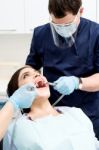 Patient Under Dental Treatment Stock Photo