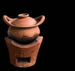 Clay Pot On Black Background Stock Photo