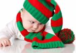 Baby With Christmas Hat And Scarf Stock Photo