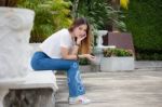 Portrait Of Thai Chinese Adult Beautiful Girl Denim Blue Bag Relax And Smile Stock Photo