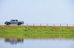 Driving On The Water Front Road Stock Photo