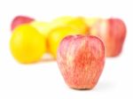 Red Apple And Fruit Blurred Group Stock Photo