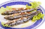 Tasty Grilled Sardines Stock Photo