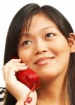 Woman Talking On A Landline Phone Stock Photo