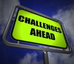 Challenges Ahead Signpost Shows To Overcome A Challenge Or Diffi Stock Photo