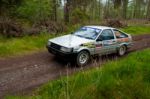 A. Tracey Driving Toyota Corolla Stock Photo