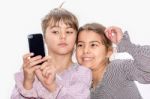 Cute Little Girls Making Selfie Stock Photo