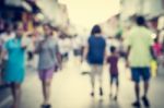 Blurred People Walking On The Street Of Old Town Stock Photo