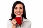 Woman Enjoying Coffee During Work Break Stock Photo