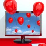 Flying Balloons On TV Monitor Stock Photo