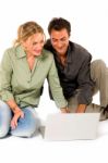 Couple Using Laptop Stock Photo