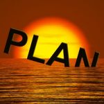 Plan Word Sinking In Sea Stock Photo