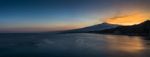 Panoramic View Of Mount Etna And The Coast Of Taormina Stock Photo