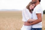 Men And Woman Hugging Stock Photo