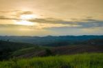 
Mountain Farm Tractors For Planting Crops. And Partially Covere Stock Photo