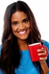 Smiling Woman With Coffee Mug Stock Photo