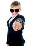 Young boy Pointing Forward Stock Photo