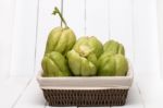 Chayote Fruit On White Wood Background Stock Photo