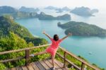 Woman On The Peak Mountain Stock Photo