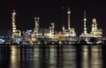 Oil Refinery Plant Night Scene Nearby River Stock Photo