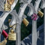 Padlocks On The Railings Of The Charles Bridge In Prague Stock Photo