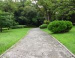 Garden Path Walk In Public Park To Forest Stock Photo