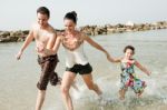 Family On The Beach Stock Photo