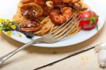 Italian Seafood Spaghetti Pasta On Red Tomato Sauce Stock Photo