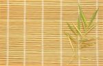 Bamboo Leaves On Bamboo Mat Stock Photo