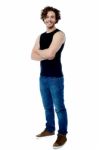 Handsome Man Posing With Folded Arms Stock Photo