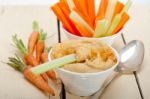 Fresh Hummus Dip With Raw Carrot And Celery Stock Photo