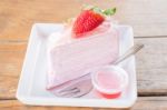 Serving Fresh Strawberry Crepe Cake Stock Photo