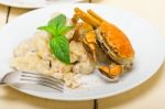 Italian Gnocchi With Seafood Sauce With Crab And Basil Stock Photo