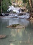 Waterfall That Flows Down To The Floor Stock Photo