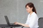 Portrait Of Thai Adult Businesswoman Beautiful Girl Using Computer Notebook Stock Photo