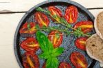 Baked Cherry Tomatoes With Basil And Thyme Stock Photo