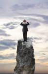 Businessman Using Binoculars Stock Photo