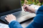 Handsome Businessman Wearing Suit And Using Modern Laptop Outdoo Stock Photo