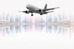 Civil Aircraft And The City Stock Photo