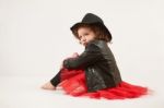 Little Girl Fashion Model With Black Hat Stock Photo