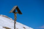 Sculpture Of Jesus On The Cross At Pordoi Stock Photo