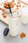 Almond Milk Bottle With Straw Stock Photo