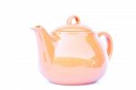 Orange Ceramic Teapot Isolated On White Background Stock Photo