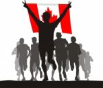 Winner Of The Athletics Competition With The Canada Flag At The Stock Photo