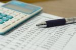 Financial Data Table And Calculator Stock Photo